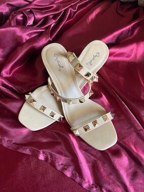 Gold studded strappy heel